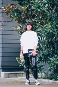 black vinyl pants, hi top convers, white turtle neck